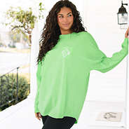 girl wearing monogrammed long sleeve shirt in lime