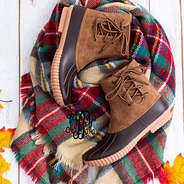 pull on side lace duck boots on monogrammed scarf