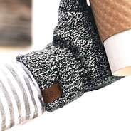 leather branding on black knit gloves