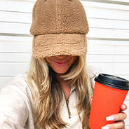 sherpa baseball hat on blonde with coffee