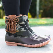 camo pull on duck boots on feet