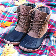navy monogrammed duck boots on plaid blanket scarf