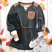 monogramed casual utility tunic with leggings and sneakers