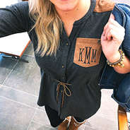 selfie of monogrammed casual utility tunic with boots