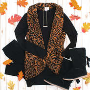 animal print fur vest with black tee and leggings