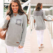 monogrammed fishing shirt with sneakers at lake dock
