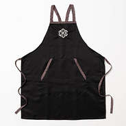 monogrammed apron in black with leopard