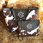 monogrammed dakota tote and crossbody on hay bales