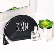 black small cosmetics case on bathroom counter
