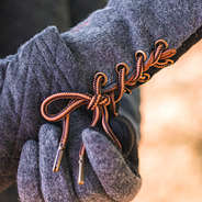 duck boot lace detailing on monogrammed gloves