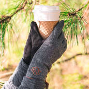 monogrammed gloves on hands holding coffee