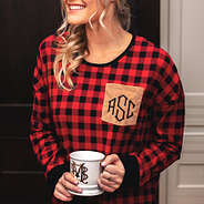 close up of monogrammed buffalo plaid lounge tunic