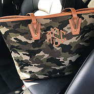 monogrammed camo waxed canvas tote in car seat