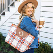 orange and navy plaid classic tote on shoulder
