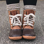 gray sherpa shoe laces on brown monogrammed duck boots