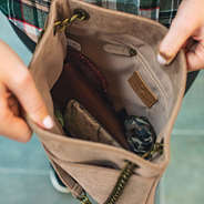 inside of monogrammed convertible suede bag