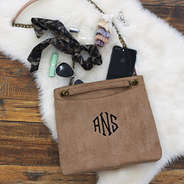 monogrammed convertible suede bag with accessories