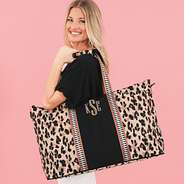 classic cheetah monogrammed weekend bag over shoulder