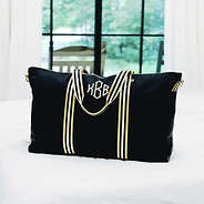 monogrammed black and gold weekend bag