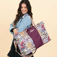savannah cheetah weekend bag on shoulder