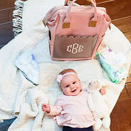 monogrammed scalloped diaper backpack with changing pad and baby
