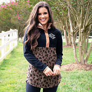 model wearing black and brown leopard fleece pullover