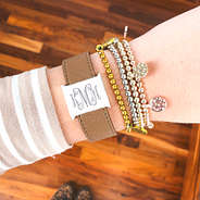 silver reversible cuff bracelet with mixed metal bracelets