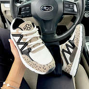 leopard sneakers in car