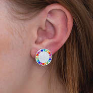 silver monogrammed rhinestone stud earrings in ear