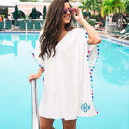 monogrammed pom pom cover up on brunette