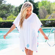 white pom pom cover up on blonde