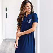 close up of monogrammed navy midi dress