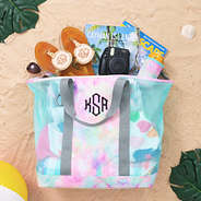 tie dye monogrammed mesh beach bag packed at the beach