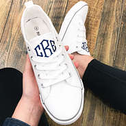 monogrammed white canvas sneaker selfie
