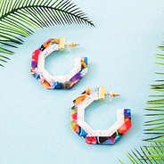 two color resin hoops on blue background