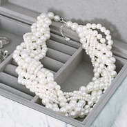 braided pearl necklace in monogrammed jewelry box