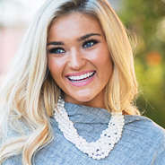 braided pearl necklace with monogrammed poncho