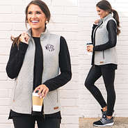 front and side of gray monogrammed quilted vest