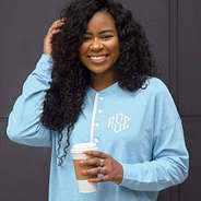 close up of monogrammed blue henley tshirt