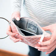 inside of monogrammed rose gold wristlet