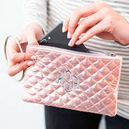 iphone in monogrammed rose gold wristlet