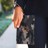 close up of monogrammed camo wristlet