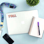 y'all sticker on laptop