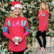 front and side of red fa la la christmas shirt
