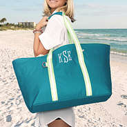 girl carrying personalized extra large tote bag in navy seersucker