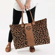 leopard weekender in hands