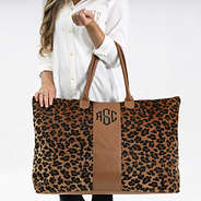 leopard weekender on arm
