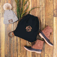 black cinch bag with duck boot lace drawstrings