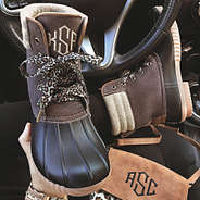 monogrammed waxed canvas duck boots with leopard laces in car