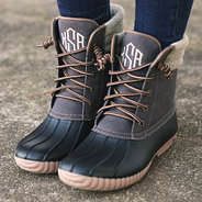 monogrammed waxed canvas duck boots on feet